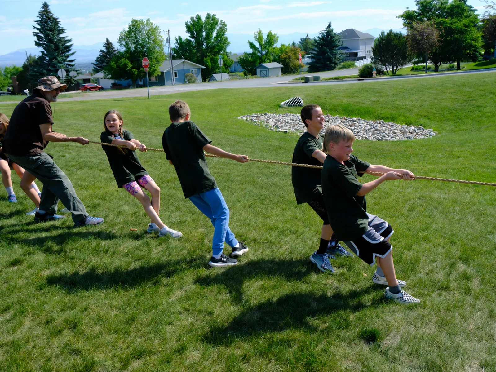 Children playing tug of war outside during BridgeKids VBS at Bridge Helena in Helena Montana